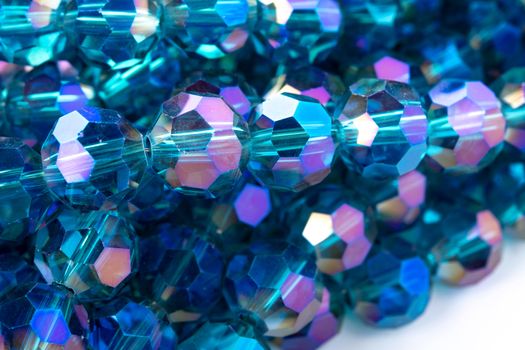 Beautiful Light Blue Glass Sparkle Crystal Isoalted Beads on white background. Use for diy beaded jewelry