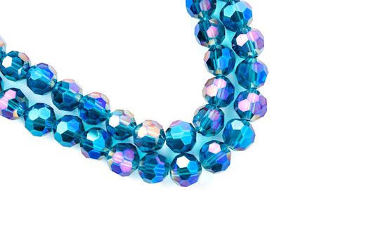 Beautiful Light Blue Glass Sparkle Crystal Isoalted Beads on white background. Use for diy beaded jewelry