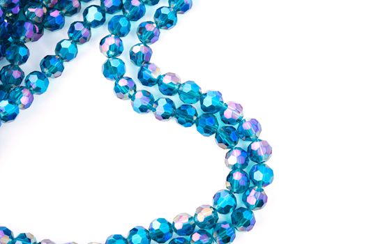 Beautiful Light Blue Glass Sparkle Crystal Isoalted Beads on white background. Use for diy beaded jewelry