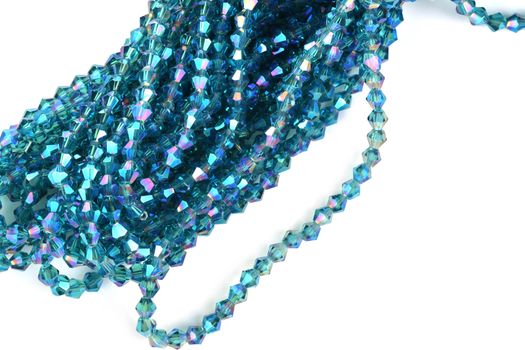 Beautiful Light Blue Glass Sparkle Crystal Isoalted Beads on white background. Use for diy beaded jewelry