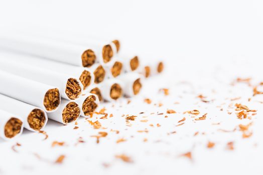 31 May of World No Tobacco Day, Close up front stack pile cigarette or tobacco on white background with copy space, Warning lung health concept