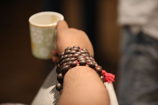 Male hand with cup