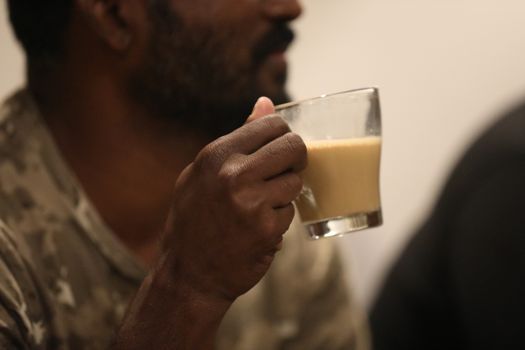 Male hand with cup