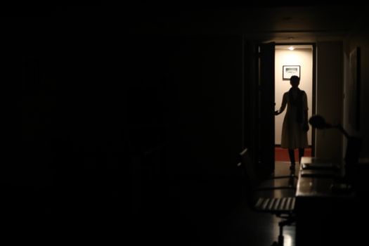 Silhouette of a Female model at door