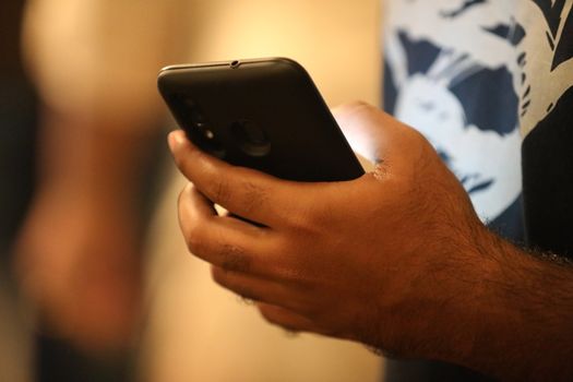 Male Model hands with cell phone