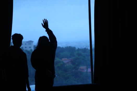 silhouettes at Window