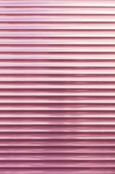 Background and texture of coral-pink metallic blinds in a horizontal line.
