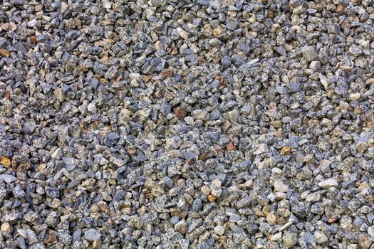 Background and texture of fine gray granite rubble