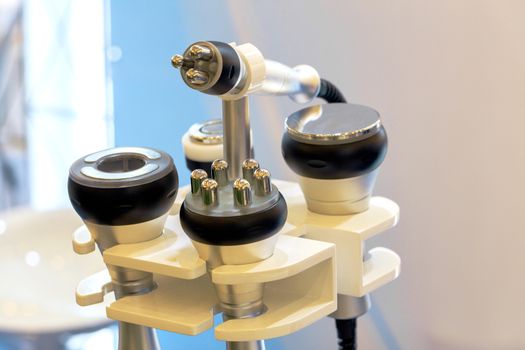 Close-up of various tools of medical cosmetology apparatus for liposuction and massage, used for the correction of the human body. Machine cosmetology.