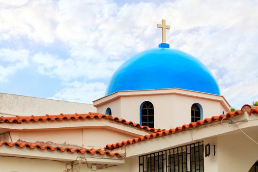 The blue dome of ritual bell tower of the Orthodox Church of Ekklisia Agios Ioannis in Loutraki, August 15, 2019, Greece.