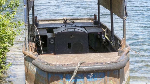 Work ship on a quarry pond