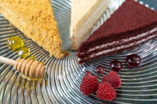 Cake with raspberry jam and honey. Sweet treat for the holiday. Delicious fresh pastries.