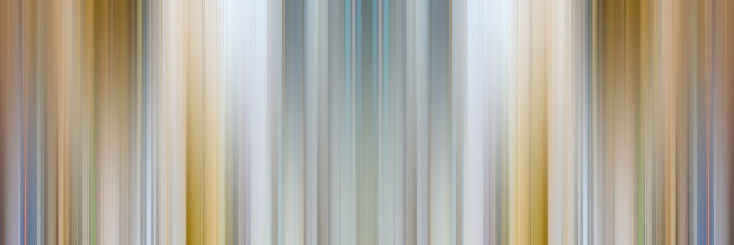 Abstract vertical lines background. Streaks are blurry in motion.