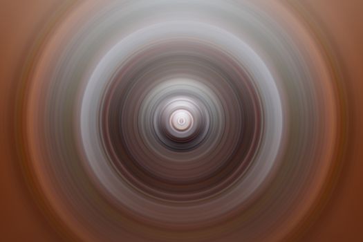 Abstract round background. Circles from the center point. Image of diverging circles. Rotation that creates circles.