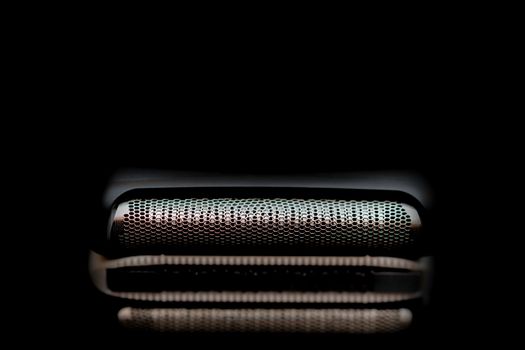 Modern mens electric shaver. Shaving device for beard. Hairdressers at home.