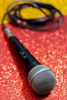 Professional dynamic microphone. Concert microphone for voice recording and sound enhancement. Sound equipment.