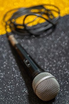 Professional dynamic microphone. Concert microphone for voice recording and sound enhancement. Sound equipment.