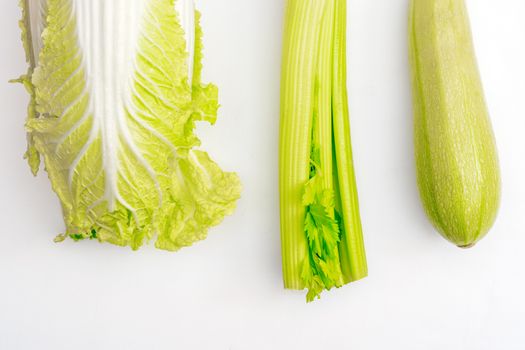 Green ripe vegetables. Vegetables on white background. Healthy food.