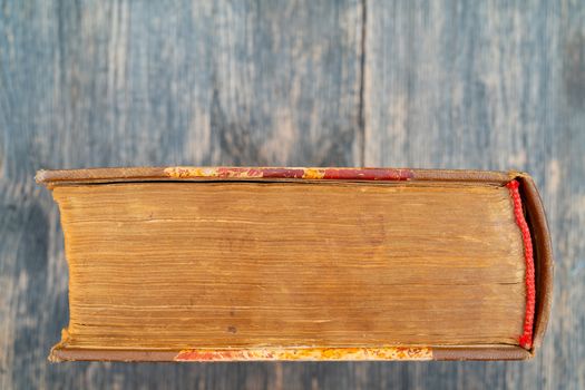 Thick old book. Vintage covers and pages. Vintage yellow pages.