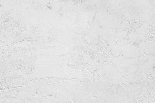 White abstract background. White stucco wall of an old house.
