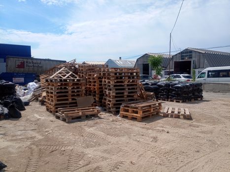 Packages with rubble and sand on the construction site. Building materials base.