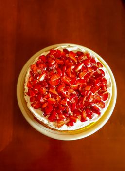 cream and strawberry cake with lemon sponge cake