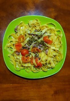 TAGLIATELLE ASPARAGI BACON AND CHERRY TOMATOES