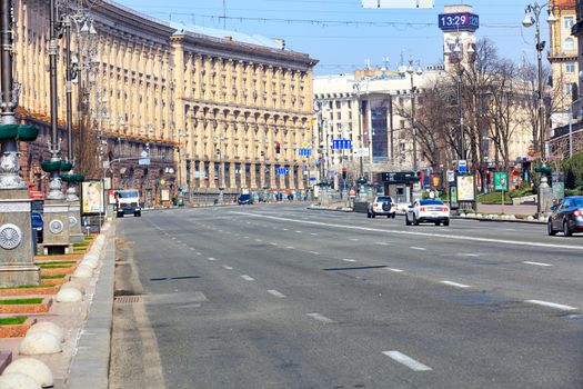 Khreschatyk deserted street in Kyiv on a sunny spring day during quarantine against the Covid 19 coronavirus pandemic. Kyiv, Ukraine - 29 marth 2020.