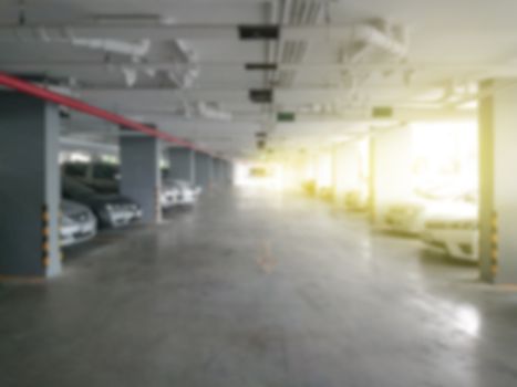 Abstract blurred of area car parking with light