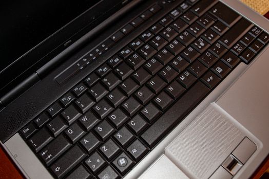 laptop keyboard with black and silver shell