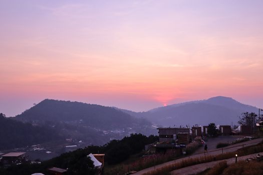 The sunset in a thai village near mountains in Chiang Mai, Thailand. The mountain scenery view