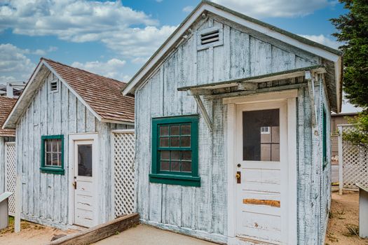 Old Faded Wood Bungalows on coast