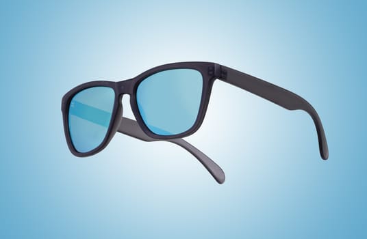 A pair of black framed sunglasses with blue lenses on a blue and white graduated background