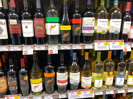 Orlando,FL/USA -5/13/20:The wine aisle sign at a Publix grocery store with a variety of wines from various vineyards.
