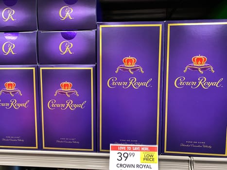 Orlando,FL/USA -5/13/20: A display of Crown Royal Canadian Whiskey at a Publix liqour store.