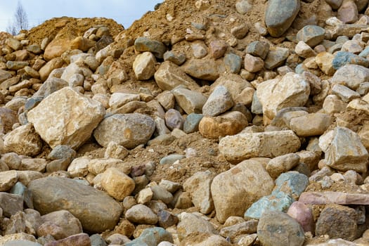 pile of cobblestones with sand prepared for construction