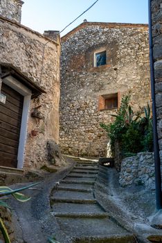 stifone, italy may 22 2020: road inside the country of stifone all made in stone