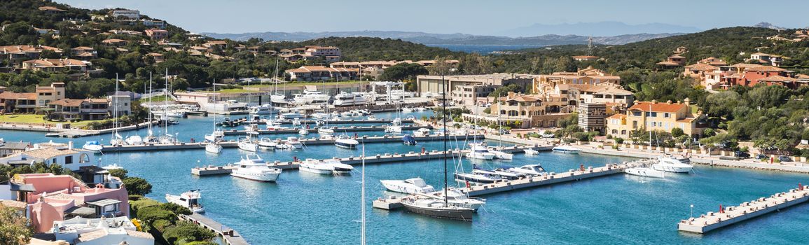 Boats in the harbor of porto servo, the exclusive village on sardinia where in the summer the rich and famous have their vacations