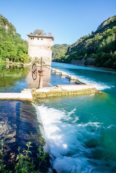 bulk of the country of a blue-watered siphon where boys bathe in the summer