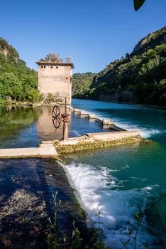 bulk of the country of a blue-watered siphon where boys bathe in the summer