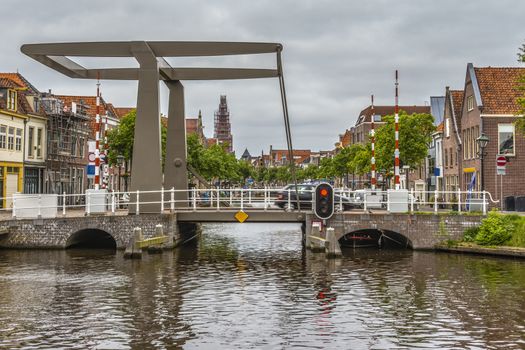 Drawbridge and buildings of the city in one of the main channels of Alkmaar Netherlands Holland