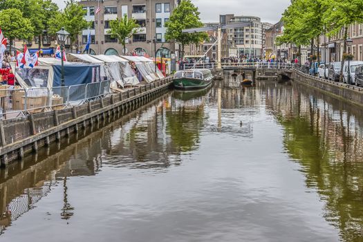 On Fridays in Alkmaar the cheese market is made, the merchandise is arrived by boat. netherlands holland