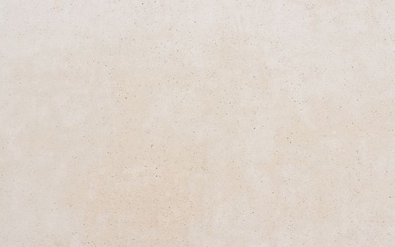 Clean concrete wall texture, beige background