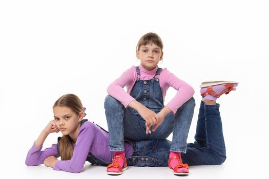 angry at each other girls against a white background