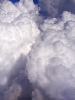 Clouds view through an airplane window