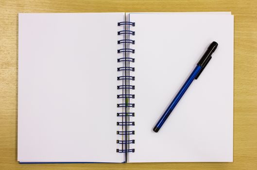 blue diary book on table office