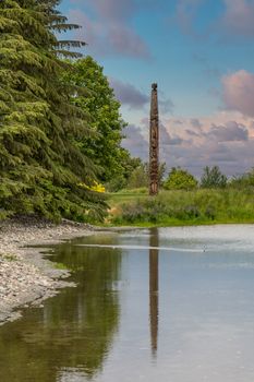 Totem Pole and Reflection in Alaska