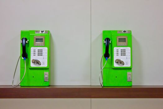 The roll of colorful public phones in the railway station