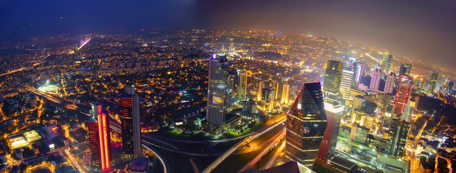 Istanbul skyline night aerial panoramic view from Sapphire tower, Levent financial district, Istanbul Turkey. Beautiful Bosphorus Bridge, business towers, modern offices, central banks, skyscrapers