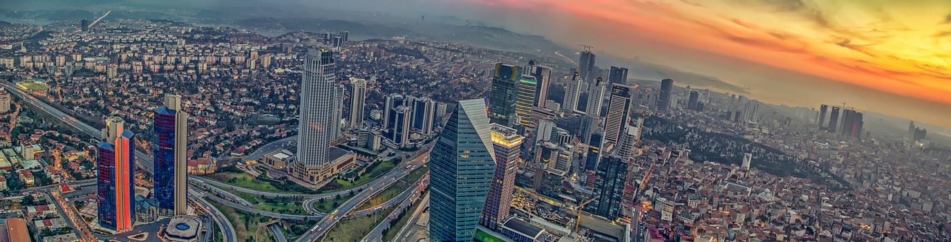 Istanbul sunset skyline aerial panoramic view from Sapphire tower, Levent Financial District, Istanbul Turkey. Beautiful Bosphorus Bridge, business towers, modern offices, central banks, skyscrapers